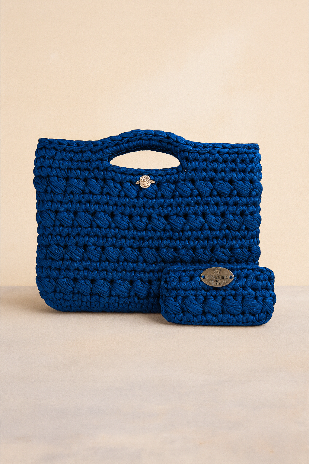 Borsa crochet blu con manici e porta spiccioli