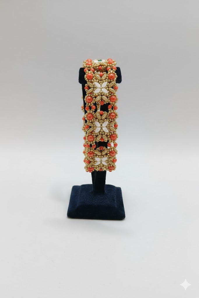 Fiore Intessuto – Bracciale Corallo e Petali